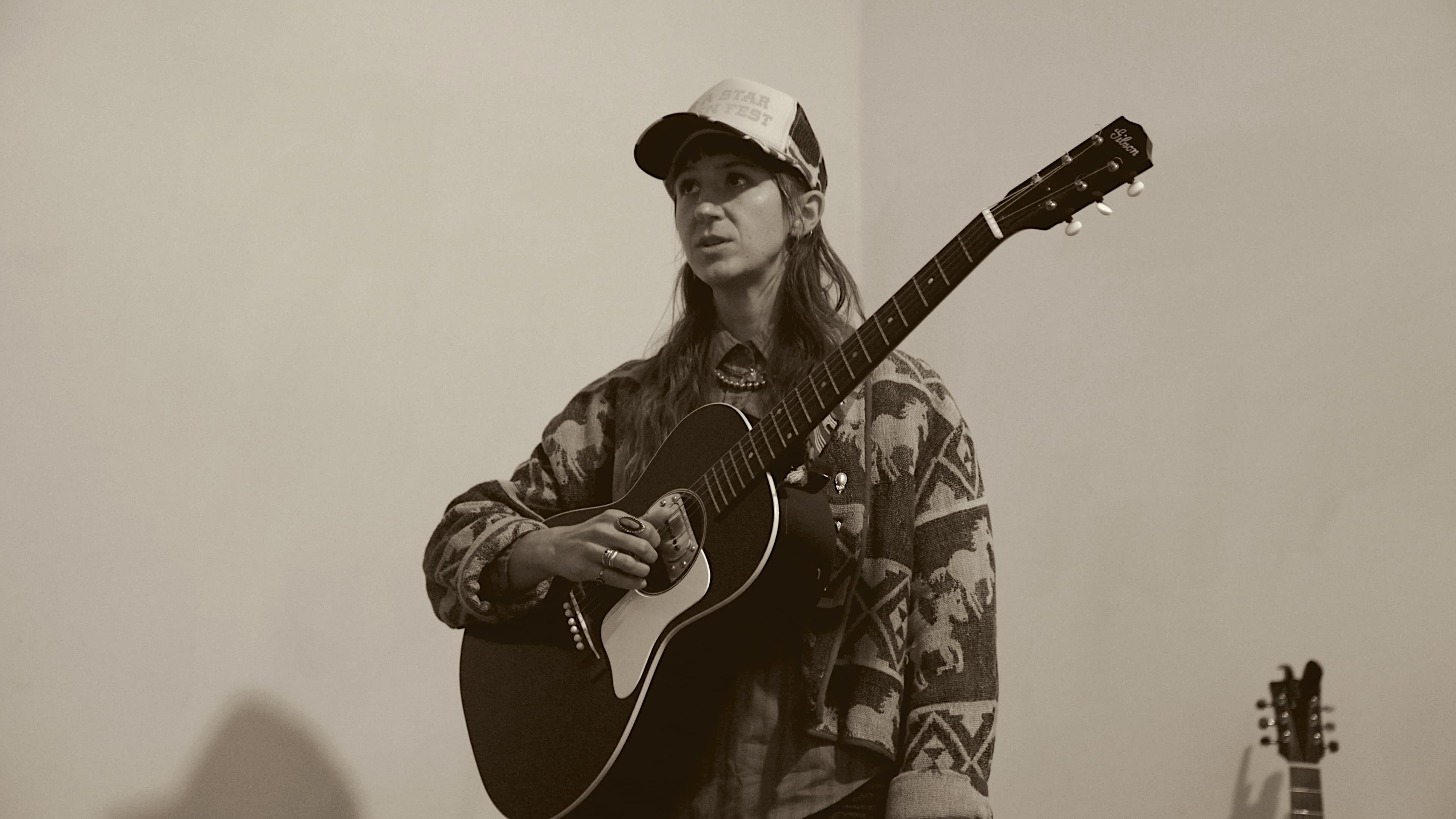 Vocalist performing at the Songwriting Sanctuary